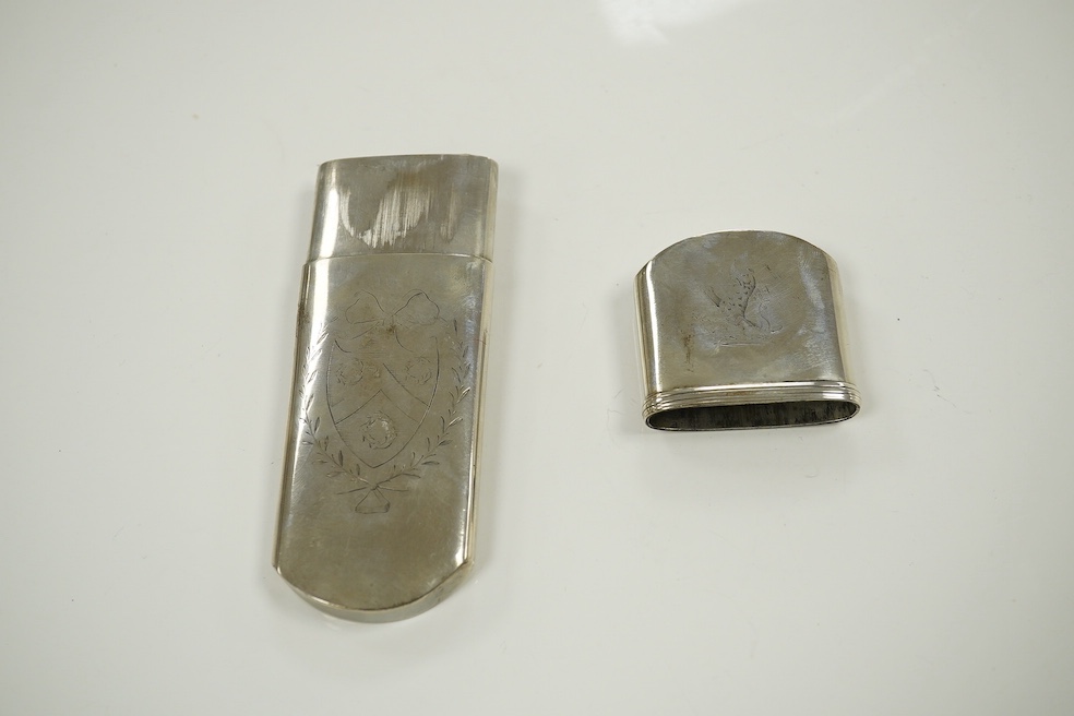 A Victorian silver pocket flask with cup base, maker George Unite, Birmingham 1865, gross 5 oz, and an unmarked Victorian white metal spectacles case. Condition - good